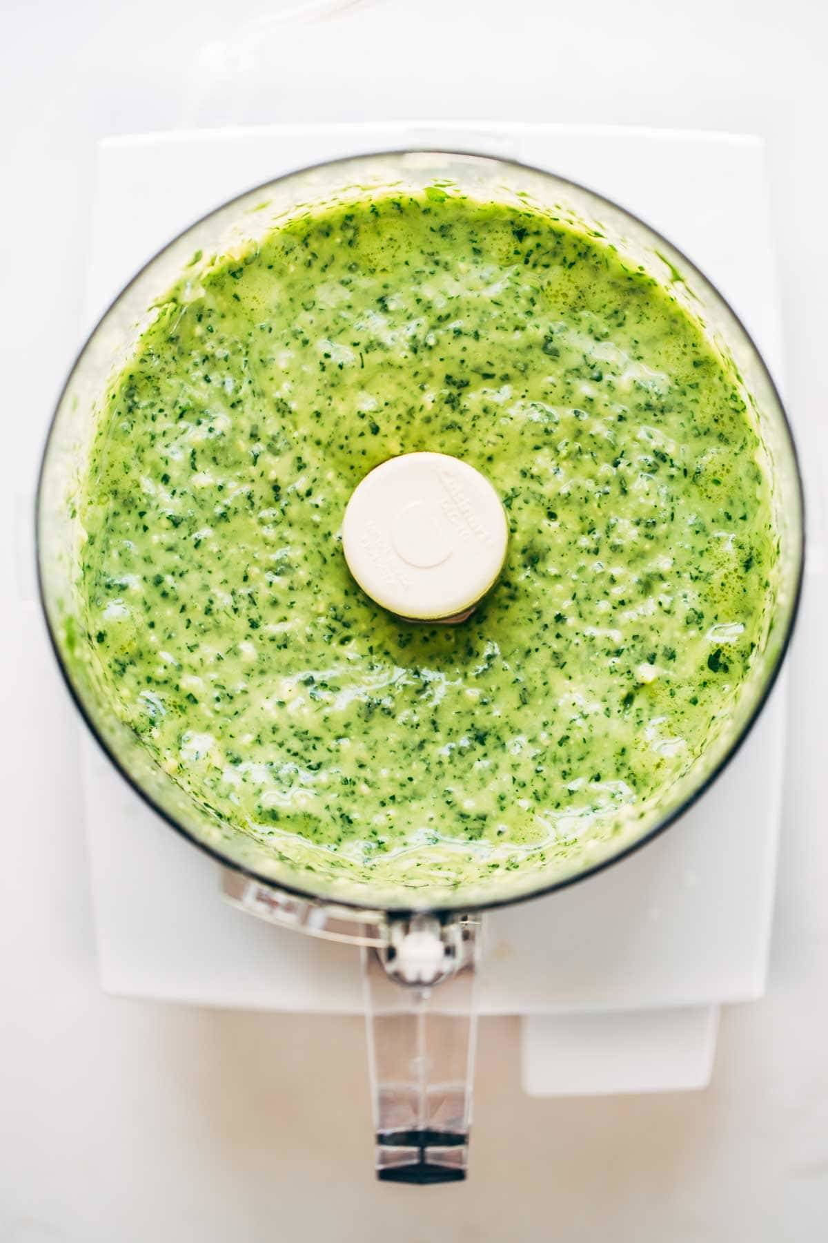 Blended Magic Green Sauce in a food processor. 